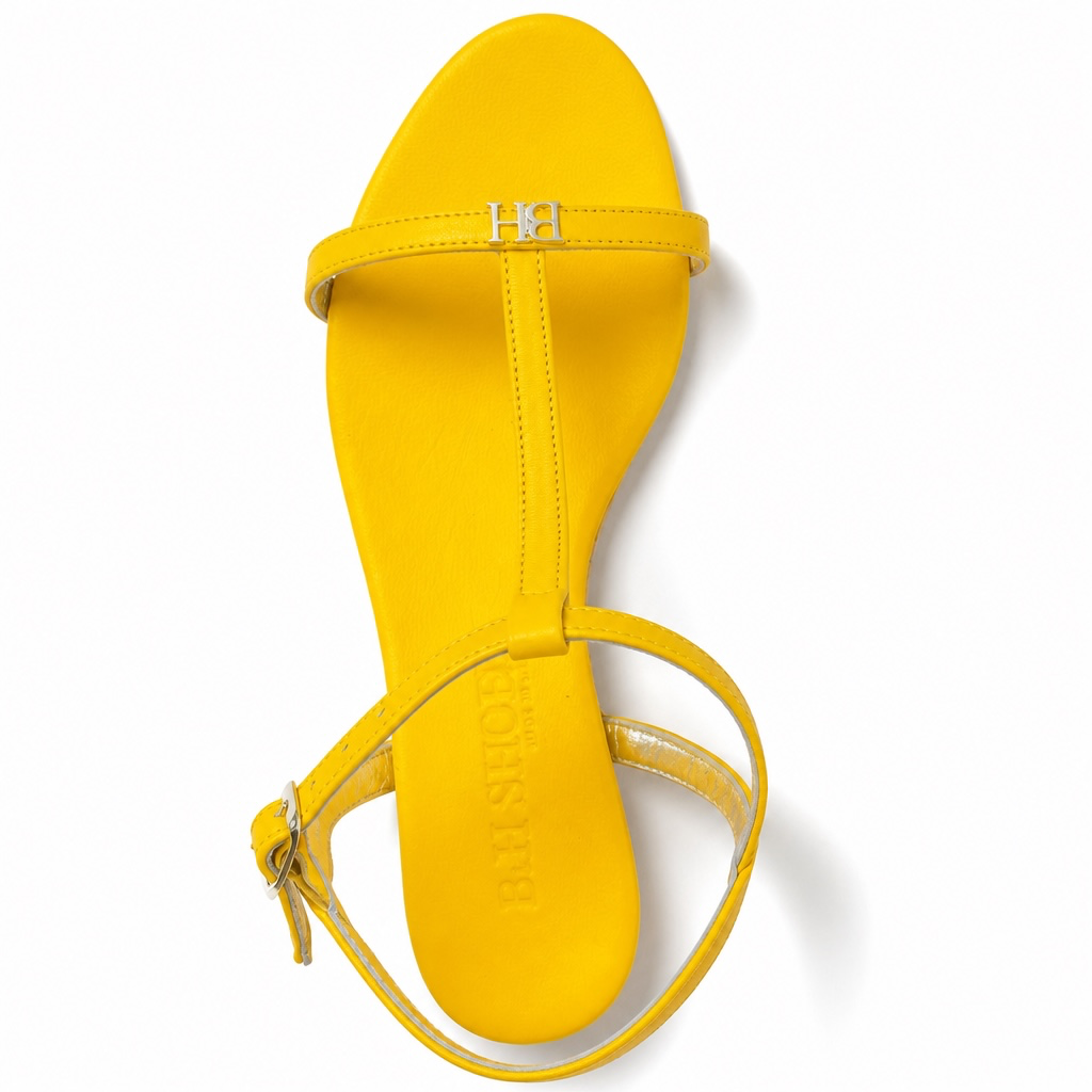 Sandalo basso t-bar da donna estivo di pelle colore giallo ocra