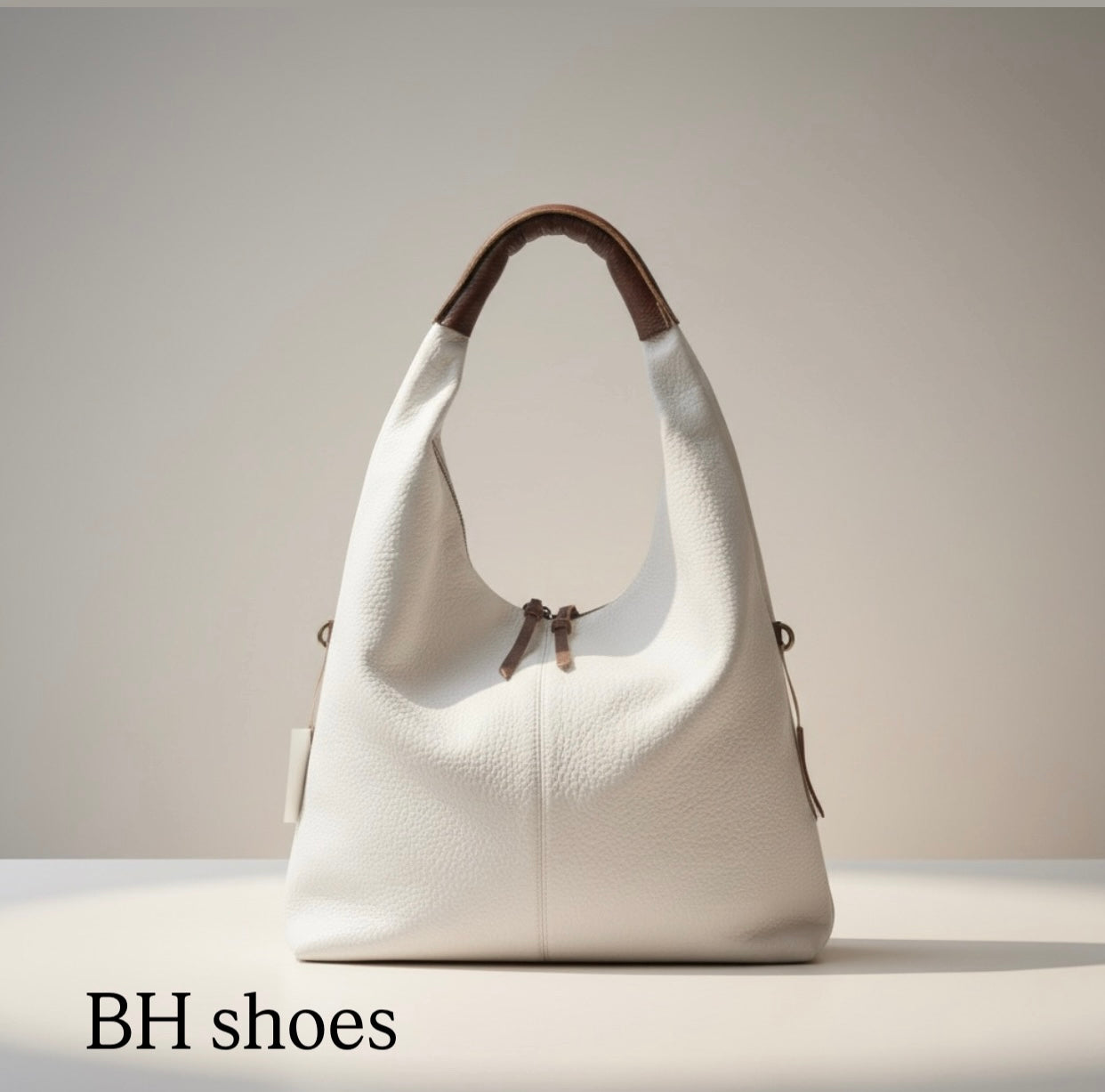“Janet’-Borsa dalla texture morbida e leggermente granulata colore bianco panna