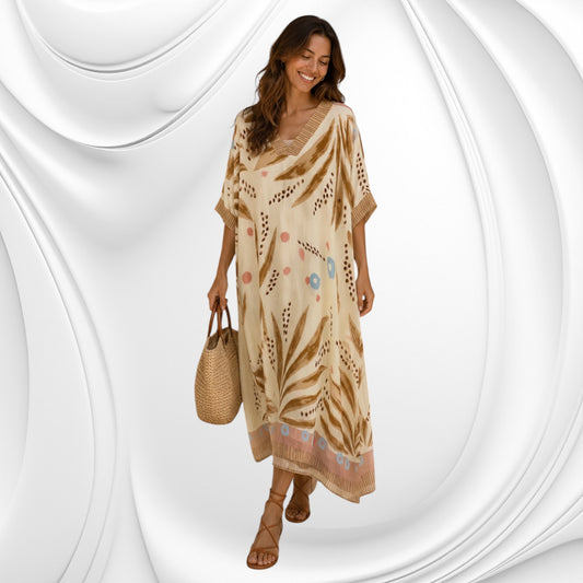 Q-Caftan lungo in stile bohémien con vestibilità ampia e rilassata, lunghezza abito midi che arriva sotto il ginocchio. La silhouette è fluida e confortevole con maniche kimono