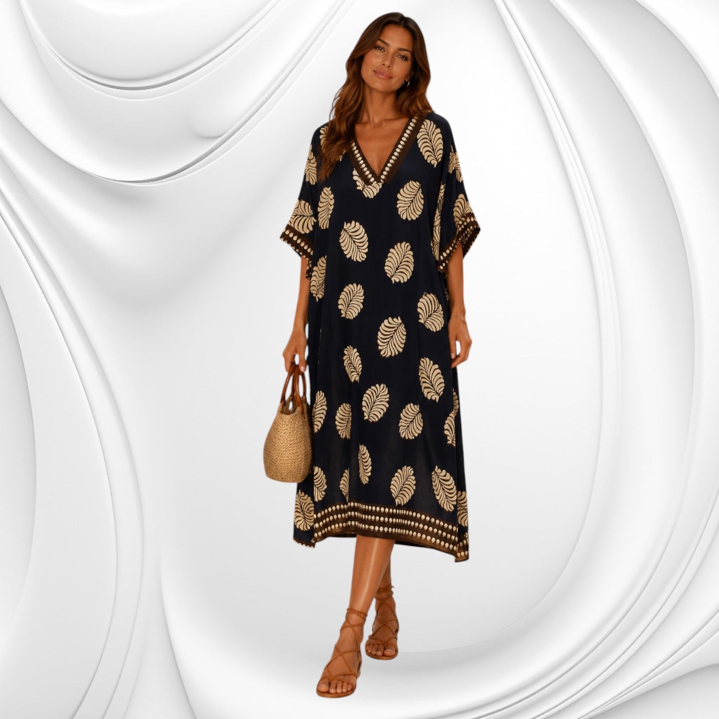 Q-Caftan lungo in stile bohémien con vestibilità ampia e rilassata, lunghezza abito midi che arriva sotto il ginocchio. La silhouette è fluida e confortevole con maniche kimono